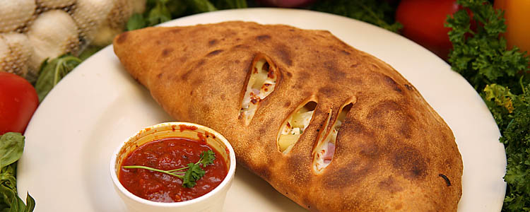 pizza pizza stuffed sandwich. The typical calzone is stuffed